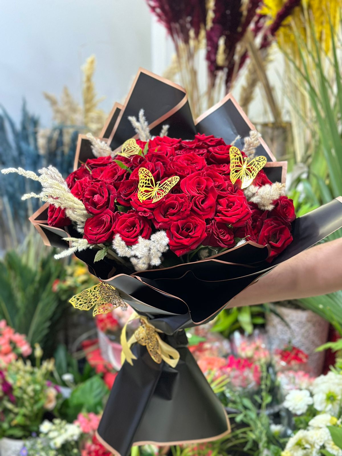 A large bouquet of red roses