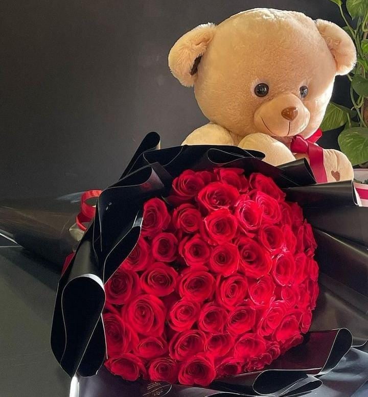 flowers and teddy bear