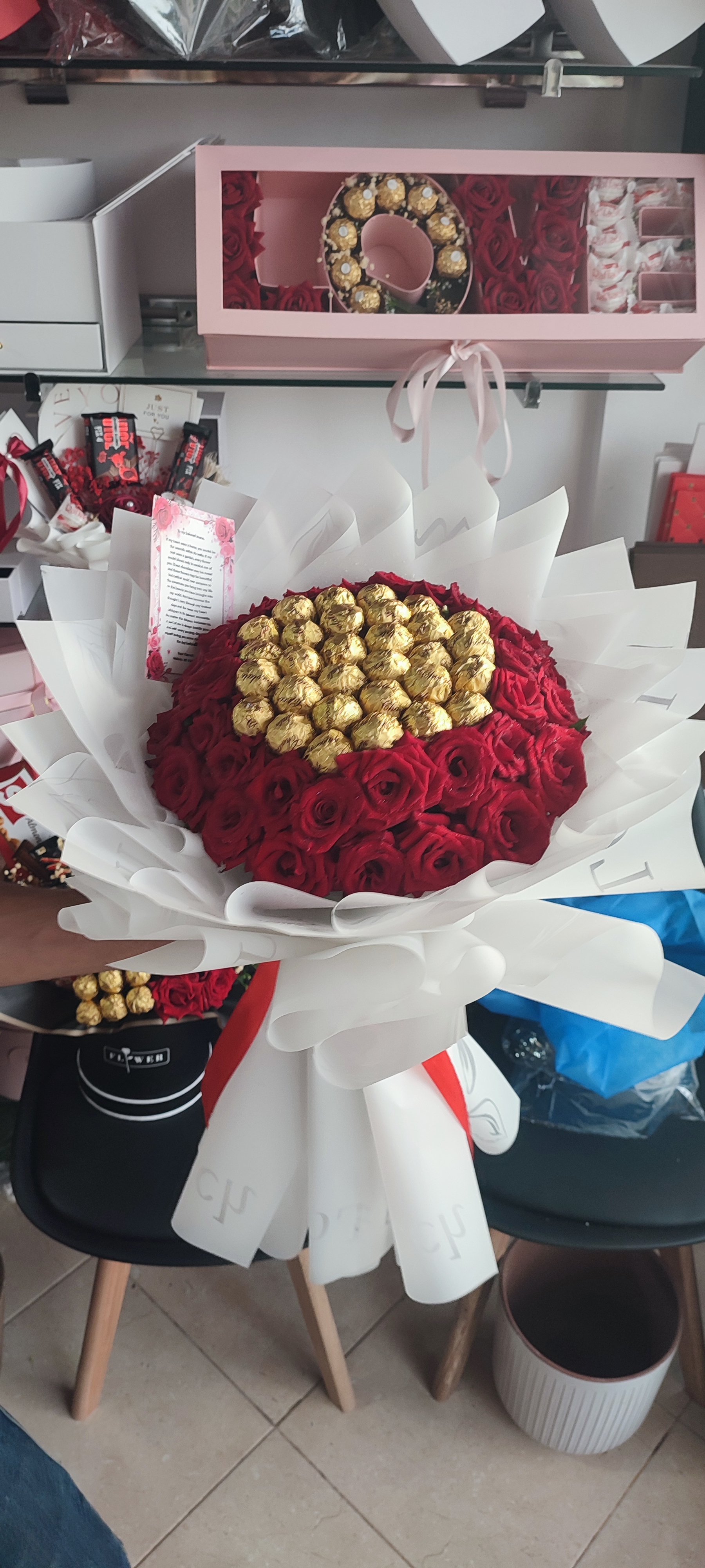 A bouquet of roses and chocolates