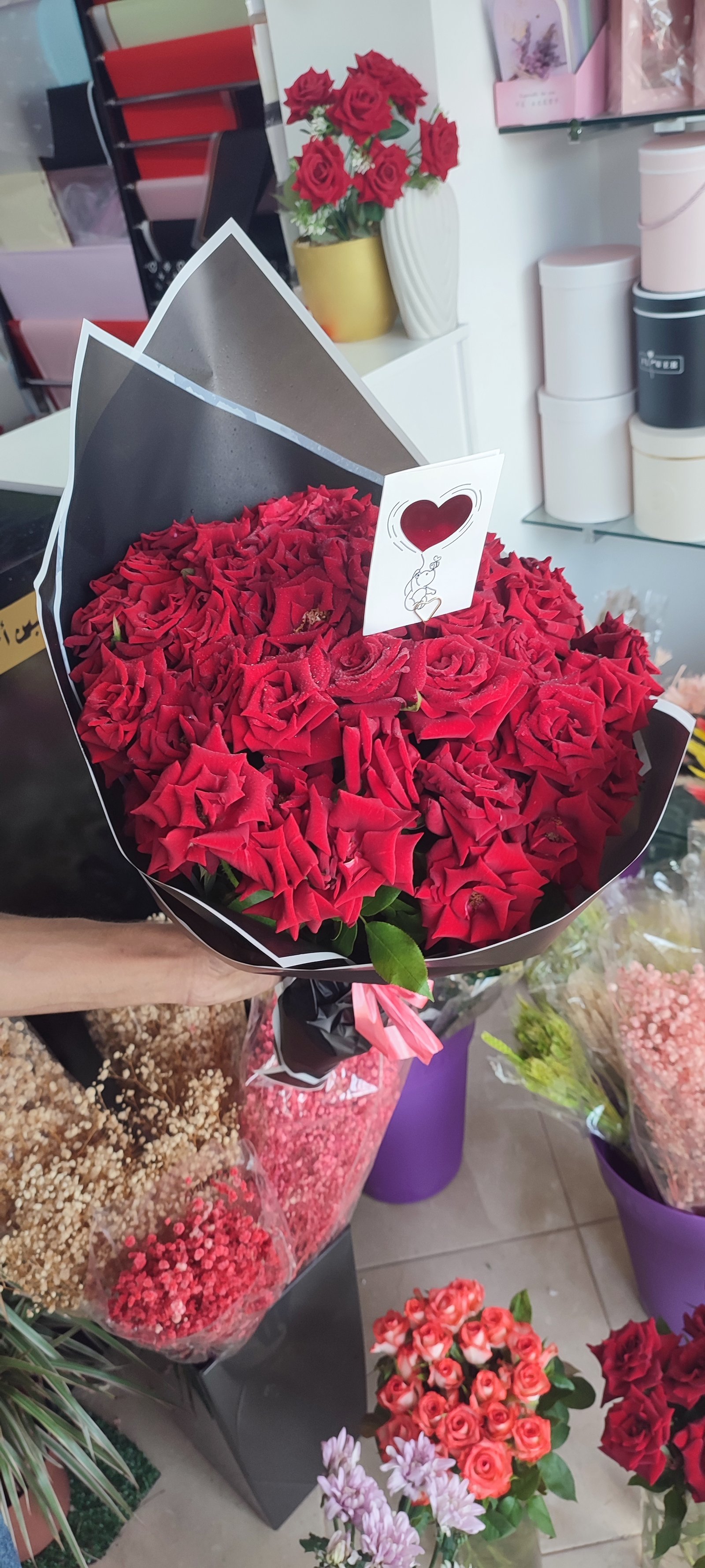 a bouquet of red roses
